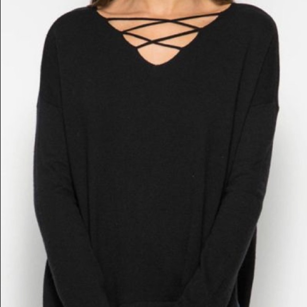 Long sleeve black dress with criss-cross front